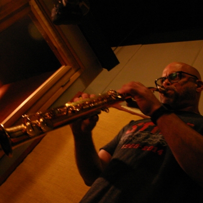 A picture of Dave Ellis playing the tenor saxophone.