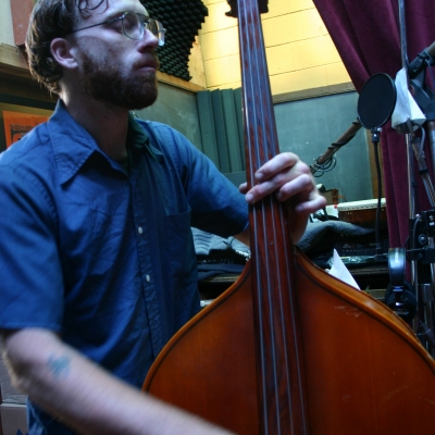 Matt Montgomery Playing the standup base on the album "Heavy Feel."