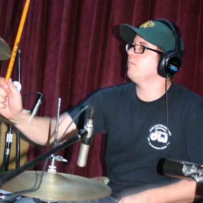 Mike "Lumpy" Hughes, playing drums on the album "Throttle Elevator Music," on Wide Hive Records.