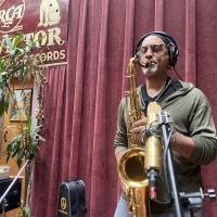 A photo of Craig Handy playing the saxophone at Wide Hive Records.