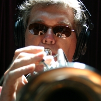 Tim Hyland playing the trumpet.